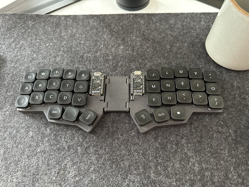 A picture of my Corne keyboard in the Miryoku layout